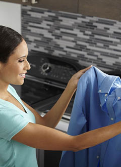 Woman drying clothing