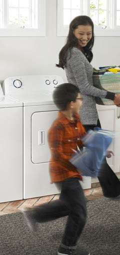 Image of mother and child in laundry room